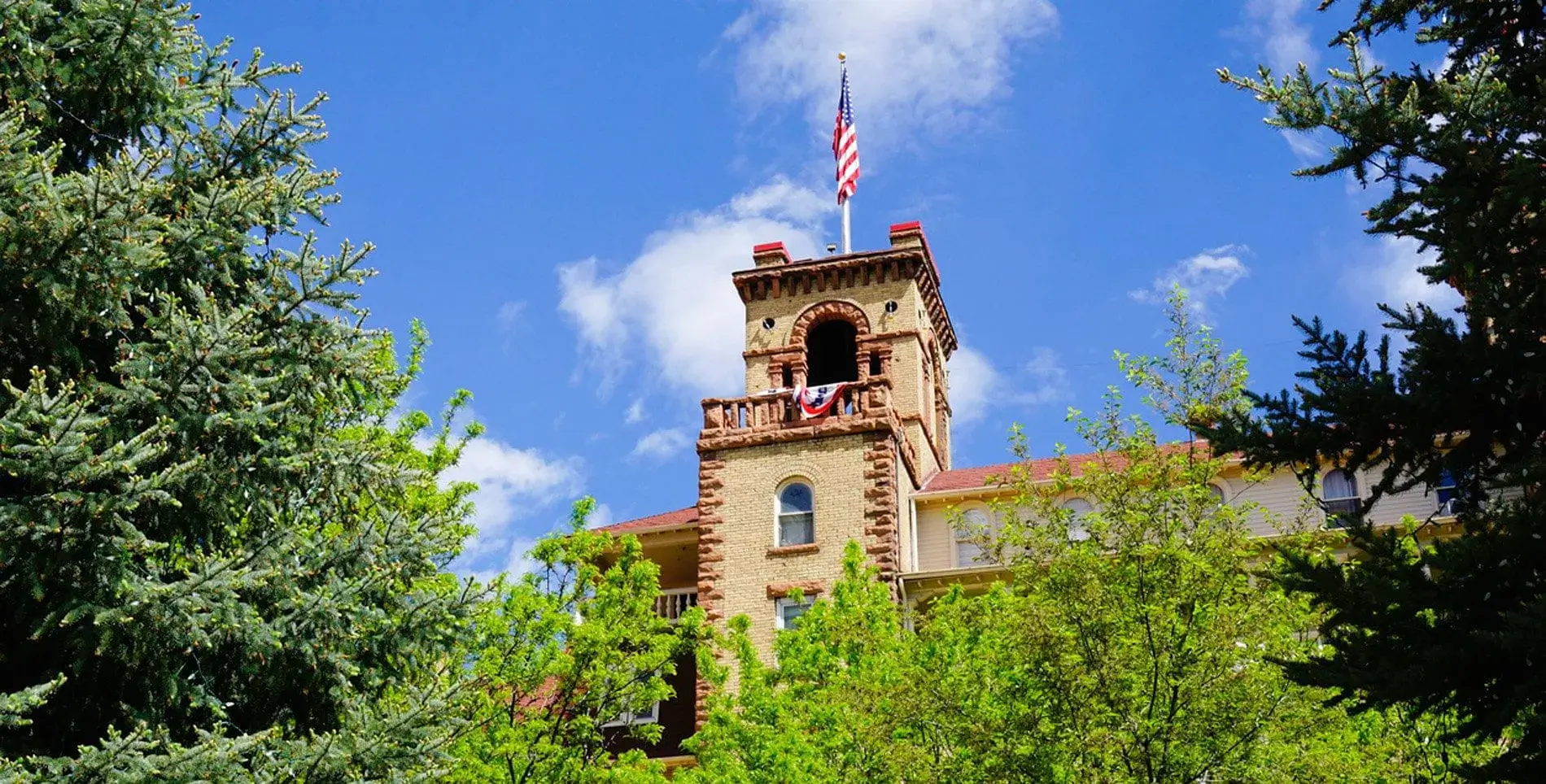 Hotel Colorado spire with U.S. flag on top