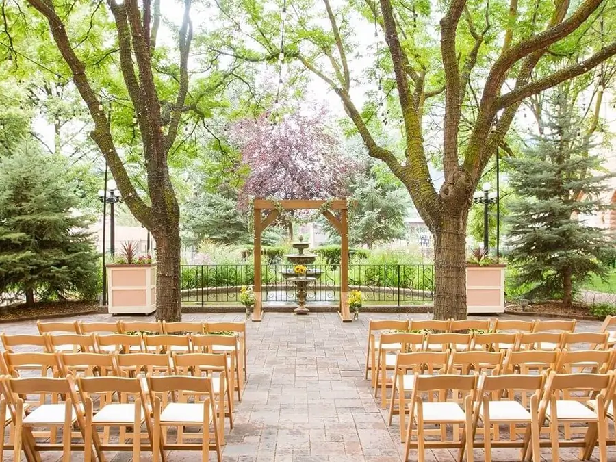 Seating for a courtyard wedding at Hotel Colorado in Glenwood Springs, CO