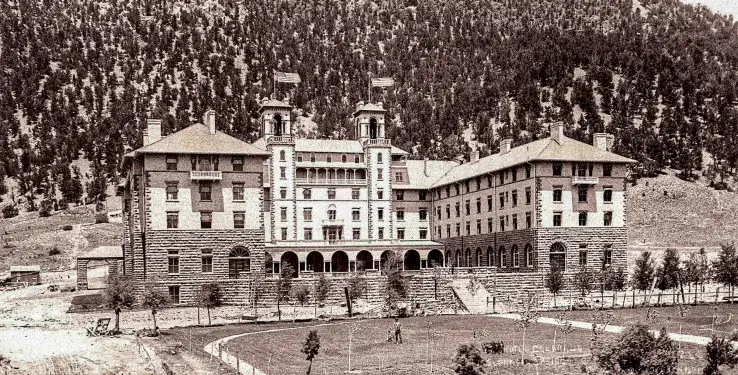 A vintage black-and-white photograph captures the grand Hotel Colorado