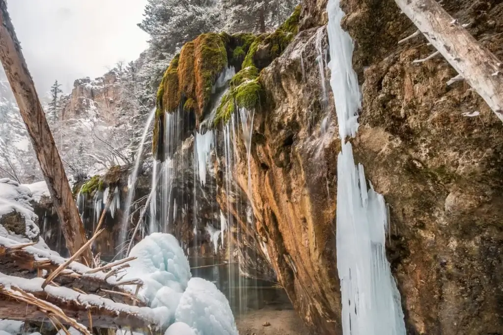 Scenic waterfall of Hanging Lake in winter